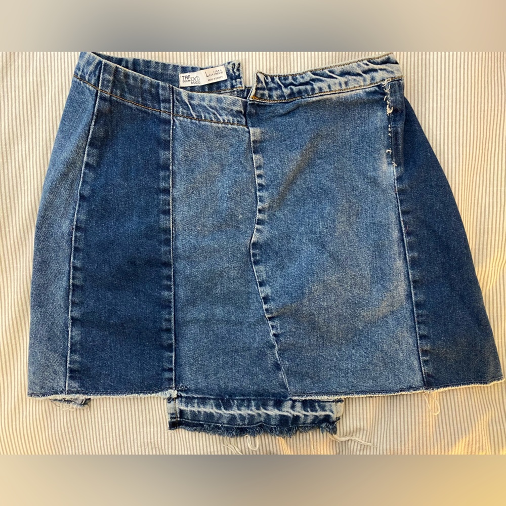Denim skirt. “Re-done” denim